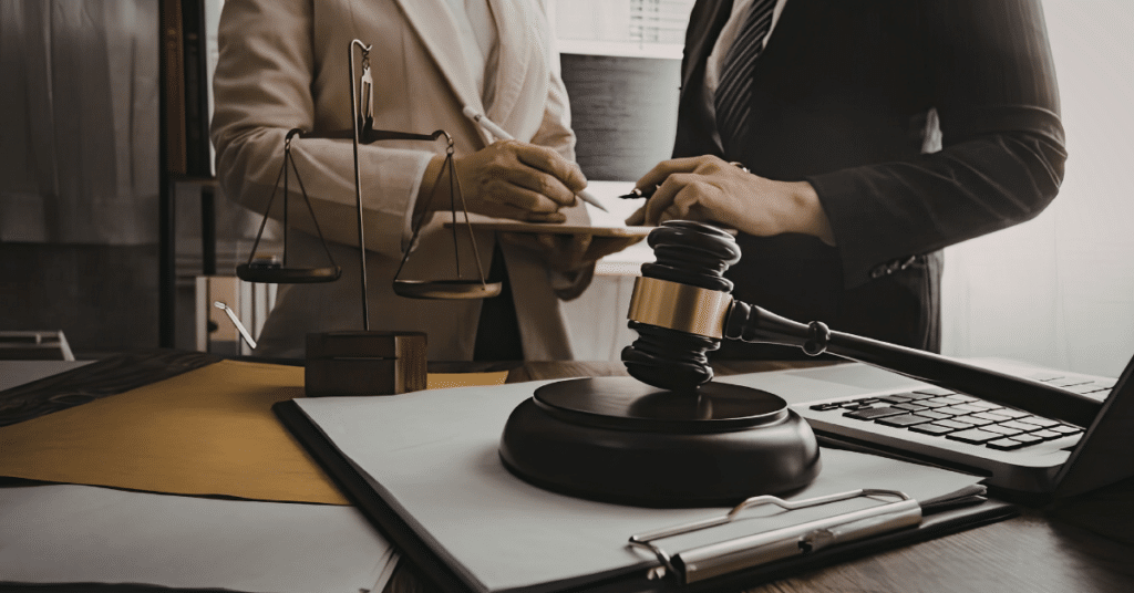 Attorneys reviewing legal truck accident documents during a case consultation