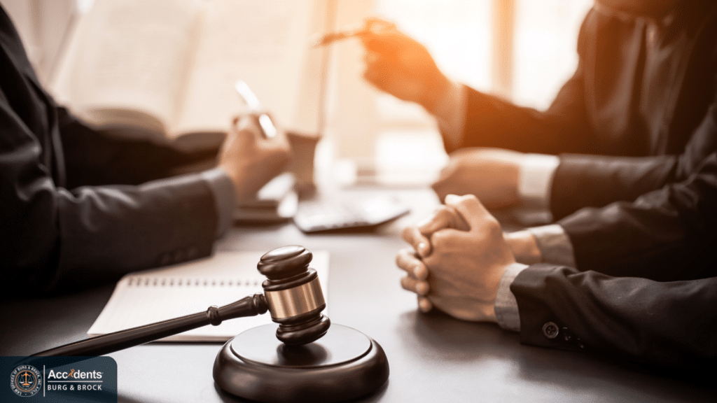 Attorney discussing a semi truck accident settlement claim with a client
